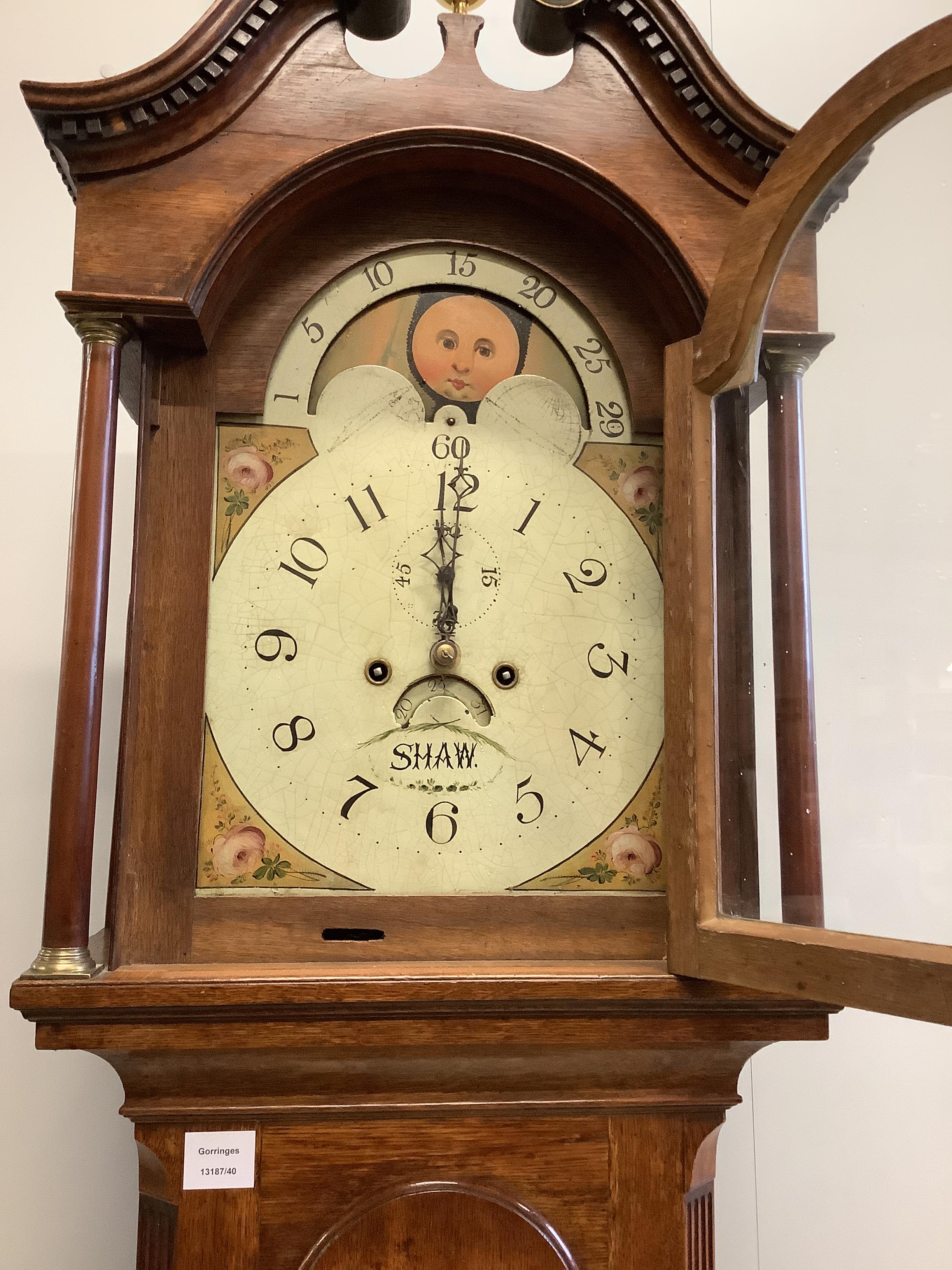An early 19th century mahogany eight day longcase clock with painted moon phase dial (no weights), height 210cm